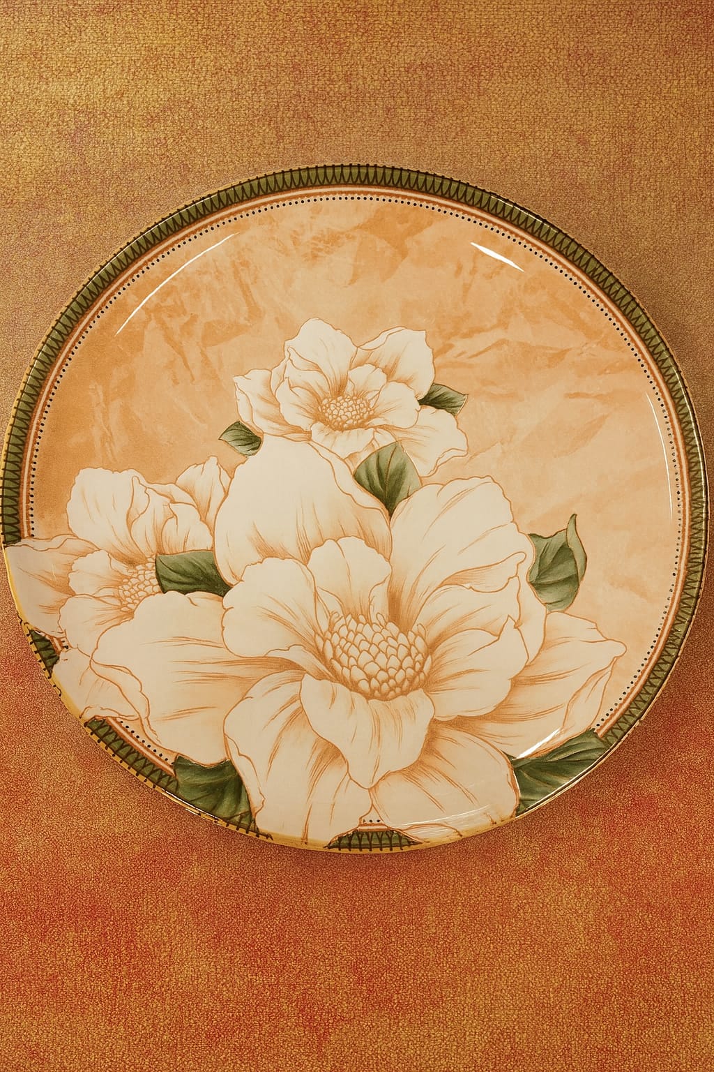 Decorative Flower Print Dinner plate with floral design on a textured brown background
