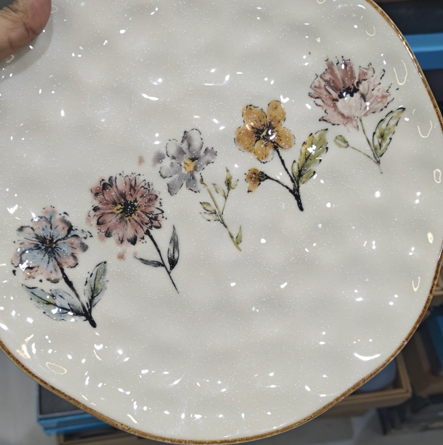 Decorative Flower Print Dinner plate with floral designs on a white background